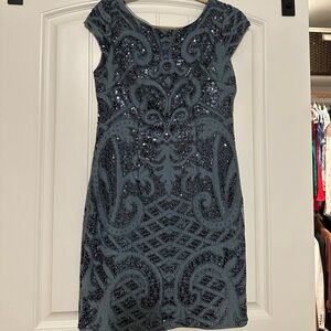 Adrianna Papell mini dress. Slate blue sequin with crochet. Size 6 US.Worn once!